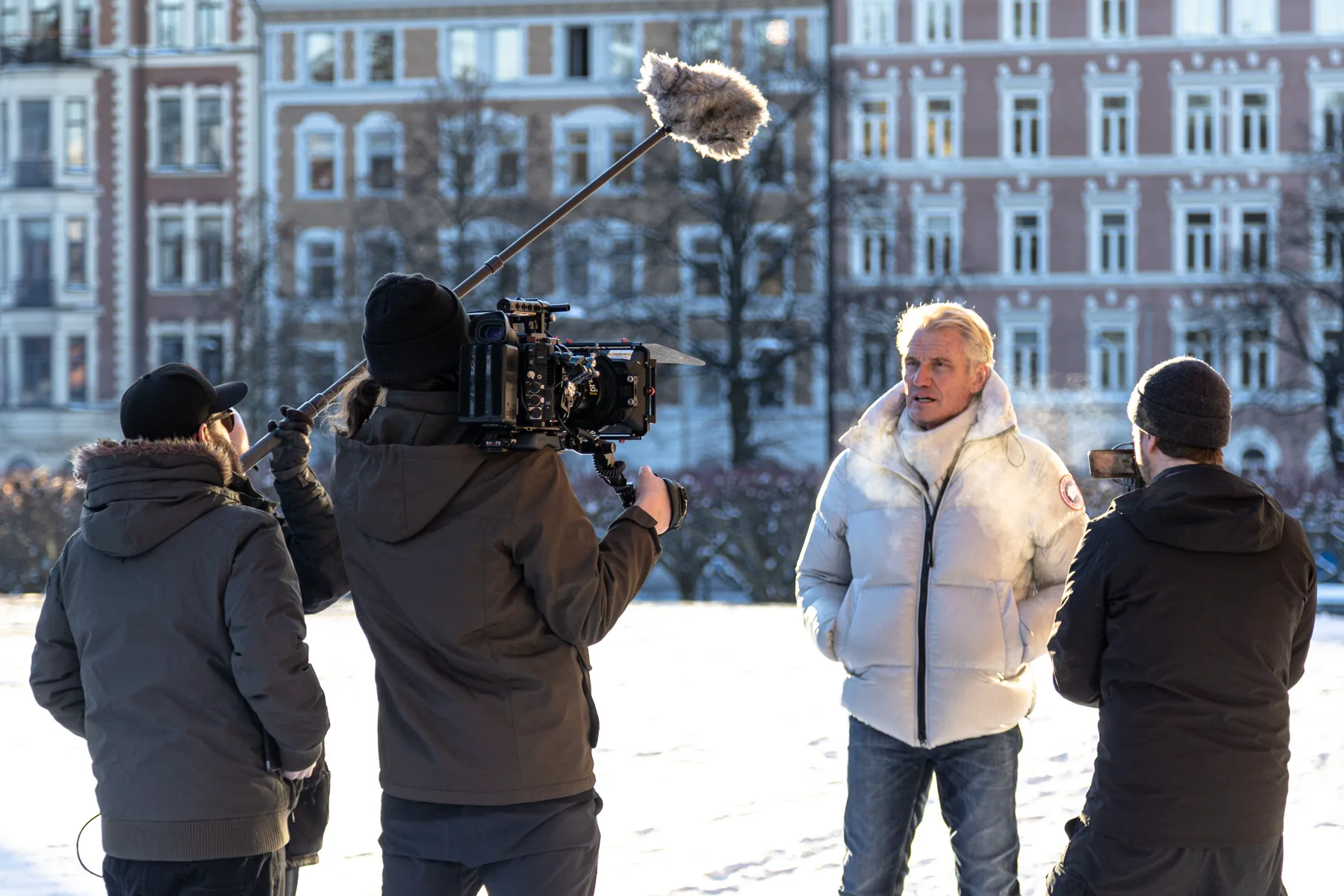 Dolph Lundgren filming outdoors with the documentary crew