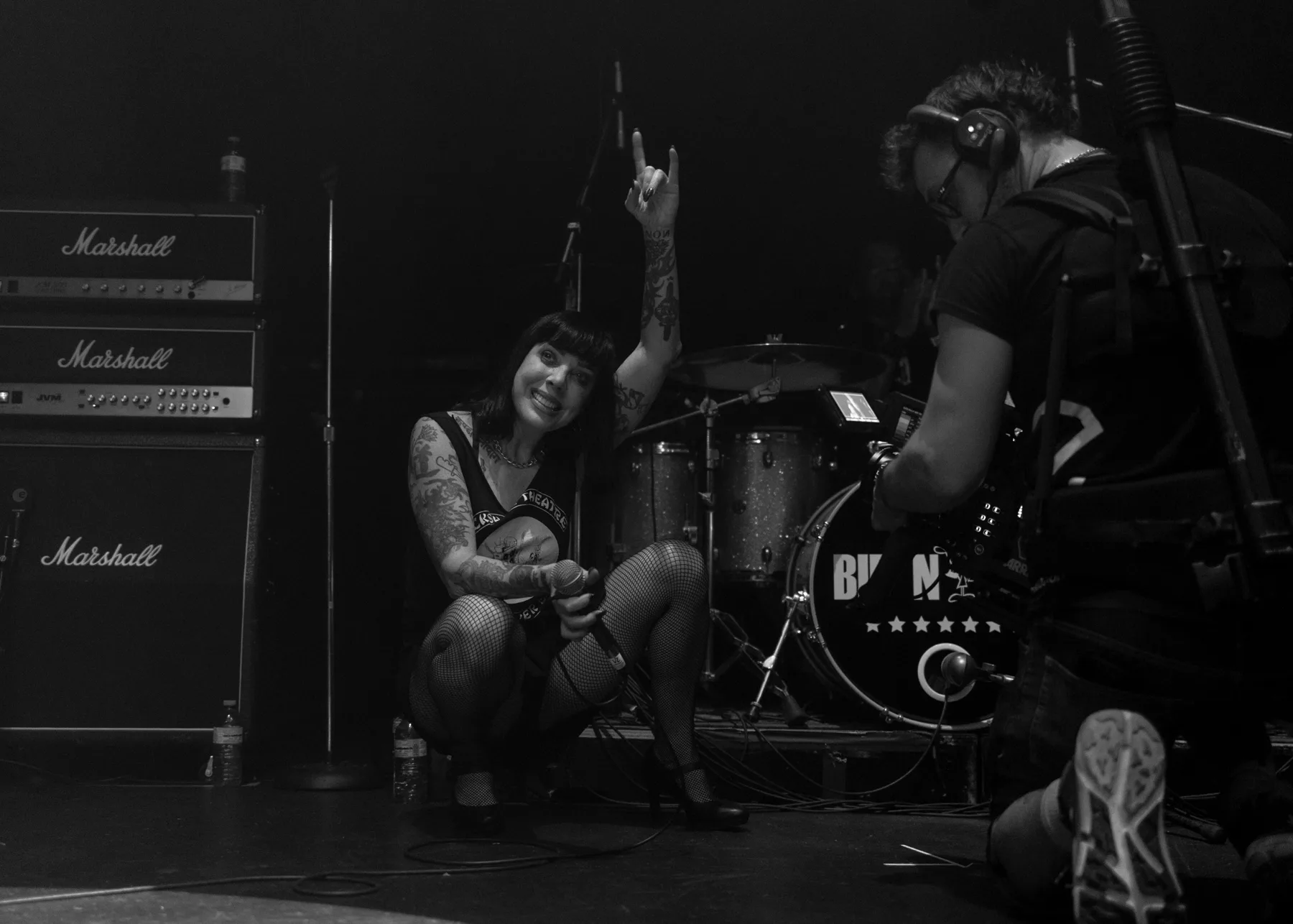Documentary crew filming a live music performance